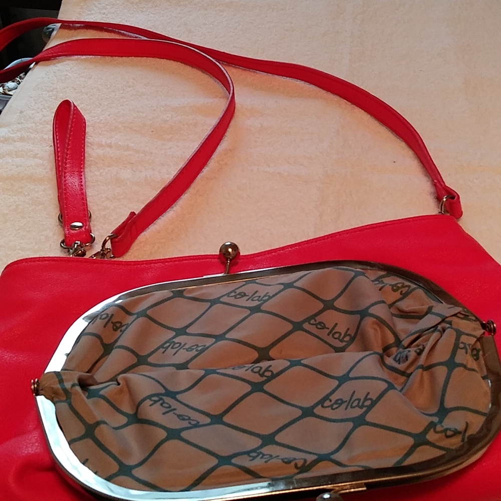 Co lab handbag. Coral pink. Crossbody or wristlet